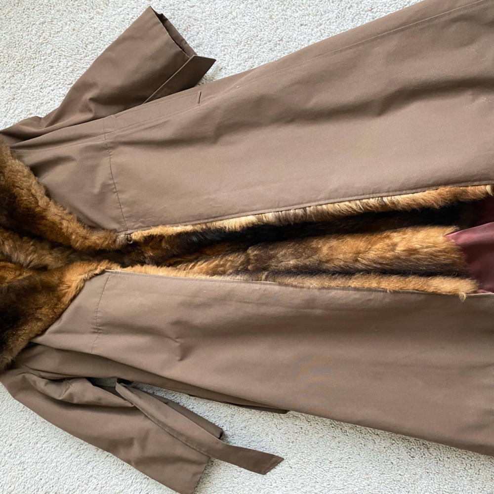Real fur lined trench coat, women’s s/m, maroon hem.